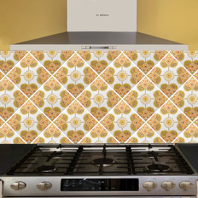Keramiskt plattor med upprepad krämdesign kakelplatta (gold and orange  geometric tile shown  on a kitchen backsplash installed  diagonally.)