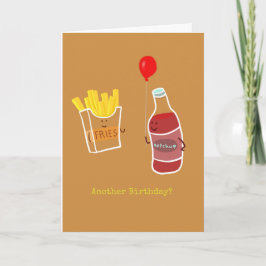 Ketchup som erbjuder en ballong till några pommes kort