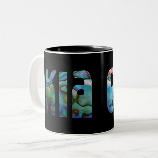 KIA ORA KIWI HÄLSNING PAUA Två-Tonad MUGG (Framsida vänster)
