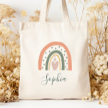 Kids Namn Boho Rainbow Heart Earth Tones Tygkasse<br><div class="desc">Den här väskan har en boho-regnbåge som dekoreras med hjärtan och polka dots i jordtoner av grönt,  terracotta och dammig ro. Anpassa det med hennes namn i ett mörk grönt handskriftsskript.</div>