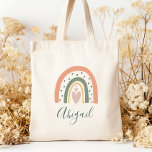 Kids Namn Boho Rainbow Heart Earth Tones Tygkasse<br><div class="desc">Den här väskan har en boho-regnbåge som dekoreras med hjärtan och polka dots i jordtoner av grönt,  terracotta och dammig ro. Anpassa det med hennes namn i ett mörk grönt handskriftsskript.</div>