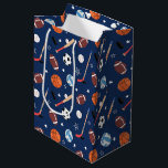 Kids Sports Equipment Pattern on Blue Birthday<br><div class="desc">This fun kids sports equipment pattern has soccer balls, footballs, baseballs, volleyballs, hockey sticks and pucks, and baseball bats. The athletic gear has a background of dark blue. It makes a great addition to a little boy or girl party or celebration. It also makes a cute addition to a birthday,...</div>