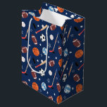 Kids Sports Equipment Pattern on Blue Birthday<br><div class="desc">This fun kids sports equipment pattern has soccer balls, footballs, baseballs, volleyballs, hockey sticks and pucks, and baseball bats. The athletic gear has a background of dark blue. It makes a great addition to a little boy or girl party or celebration. It also makes a cute addition to a birthday,...</div>