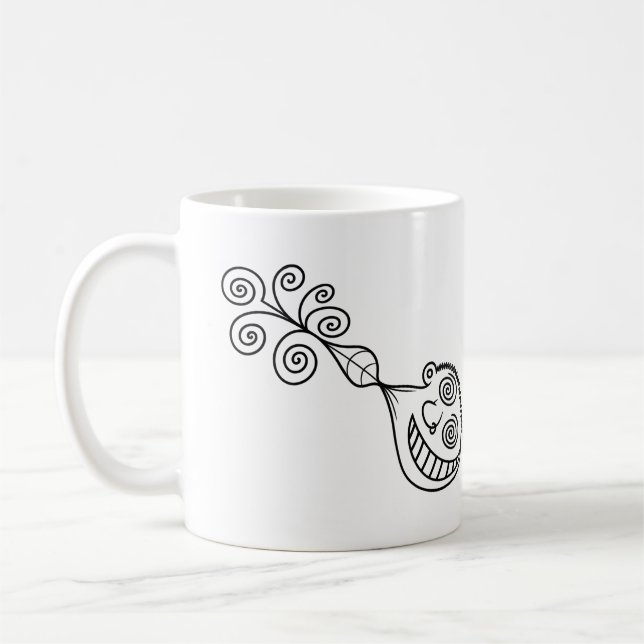Kille som rycktes upp kaffemugg (Vänster)