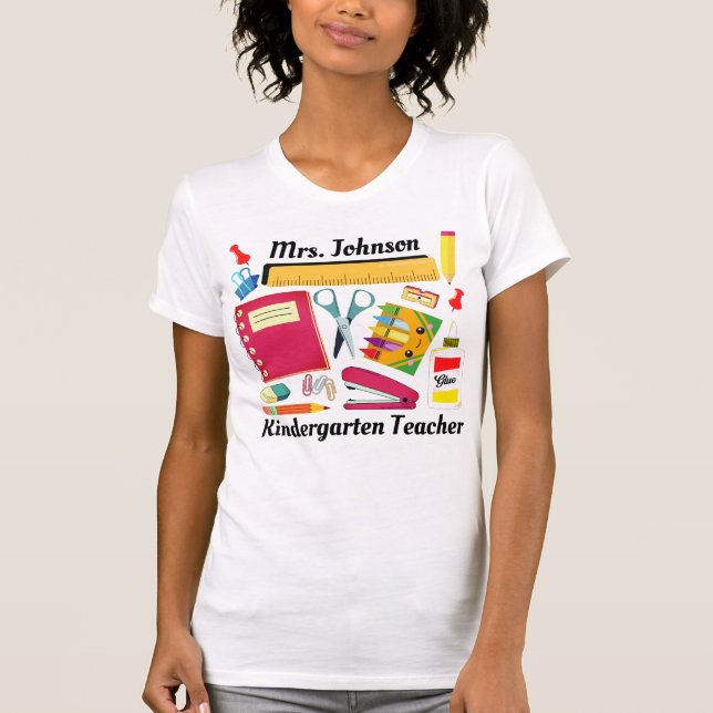 Kinder Teacher's School Supplies Womans T-Shirt (Framsida)