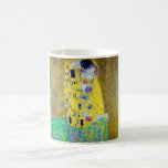 Kiss, Gustav Klimt Kaffemugg<br><div class="desc">Gustav Klimt (14 juli, 1862-6 februari 1918) var en österrikisk symbolisk målare och en av de mest framträdande medlemmarna i Wiens utlandsrörelse. Klimt är märkt för målningar, murar, skisser och andra föremål. Förutom hans verk, som omfattar anklagelser och porträtt, målade han upp landskap. Bland konstnärer i Wienutträdet var Klimt den...</div>