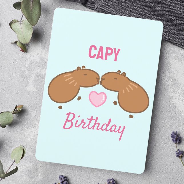 Kissing Capybara par födelsedagskort Julkort (Wishing a happy birthday with animal pun art featuring two kissing capybaras and love.)