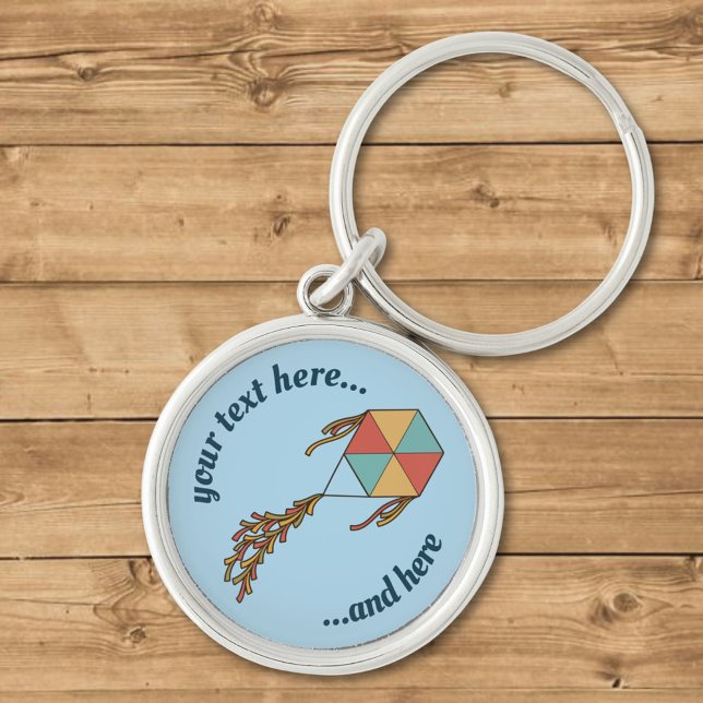 Kite Icon Light Blue Rund Silverfärgad Nyckelring (Skapare uppladdad)
