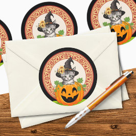 Kitten i en Pumpkin Halloween Sticker Runt Klistermärke