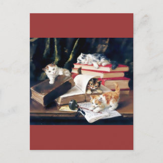 Kittens leker på skrivbordet vykort