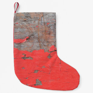 Kläder av gammalt och skalat målat trä (bl.a. med liten julstrumpa