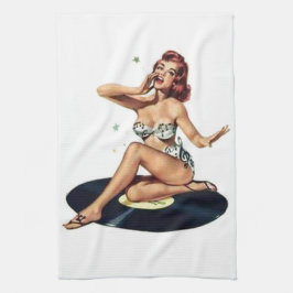 Klämma fast upp flickasitta på rekord kökshandduk