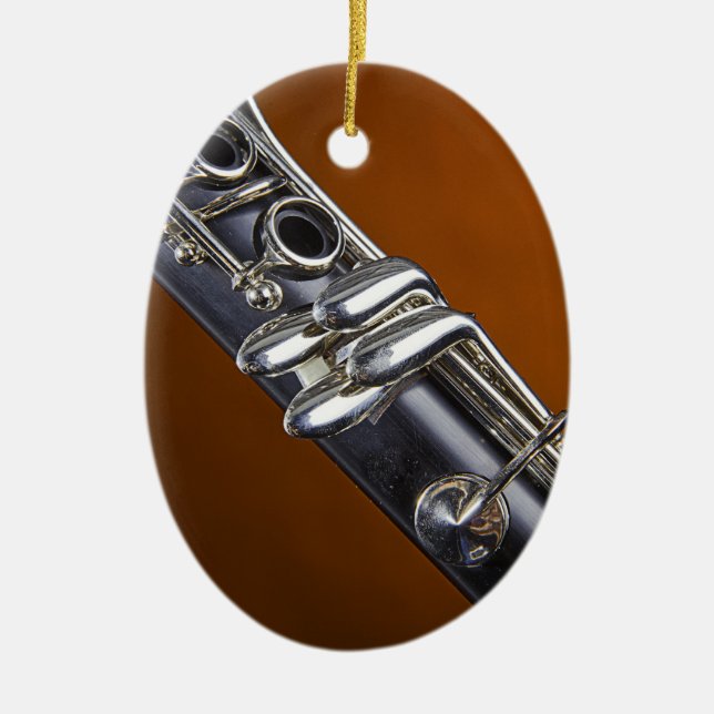 Klarinett med den guld- bakgrundsprydnaden julgransprydnad keramik (Framsidan)