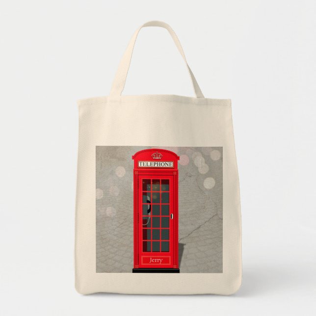 Klassisk London röd telefonkiosk med namn  Tygkasse (Framsidan)