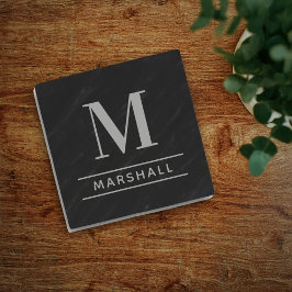 Klassisk monogram med serif i grå tenngråa färger stenunderlägg