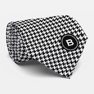 Klassisk svart och vit houndstoft med monogram slips