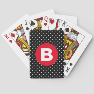 Klassisk svart och vit polkudde med rött monogram casinokort