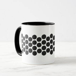 Klassisk svart prickig kaffekopp