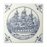 Klassisk Vintage Blue Sea Sailing Frakt on Ivory Kakelplatta<br><div class="desc">Vintage illustration av en segelbåt med svanar på dess segel till havs i cirkel med hörngräns i dammiga blå toner på elfenbensvit för älskare om hav,  nautiska och kustnära tema,  för badrum eller något annat utrymme</div>