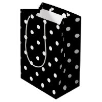 Klassiska svarta och vita polkadoter