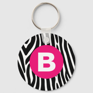 Klassiska zebrarandiga med ljusrosa monogram nyckelring