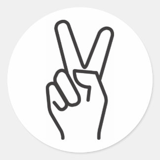 klassiskt stiliserat segertecken runt klistermärke