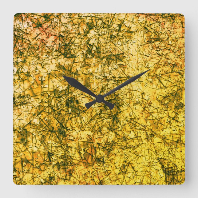 Klickor på en bild med lätt fläckig  gult fyrkantig klocka (Framsida)