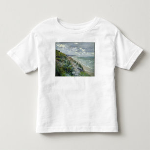 Klippor vid havet på Trouville Tee