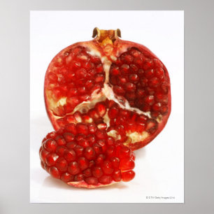 Klippte halvan en mogen pomegranate till blottan poster