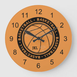 Klocka för basketmonogram på väggen