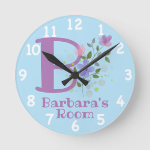 Klocka i en blomsterdesign med namnet Barbara