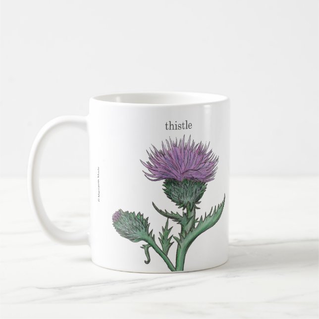 Klumaran/ thistle (skotsk gaelisk översättning) kaffemugg (Vänster)