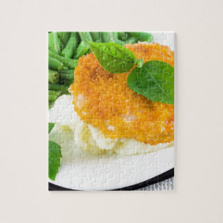 Klumpar av höna, mosade potatisar och haricot vert pussel