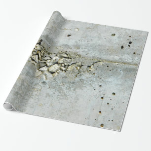 Knäckt betongvägg med lilla stenar presentpapper