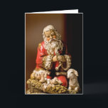 Knäfalla Santa Helgkort<br><div class="desc">Den knäfalla Santaen som älskar Kristusbarnet,  är en av min favorit- julbilder. Jag har kopplat ihop den med Santas böninsida kortet. Jag tänker att skulle detta gör en mycket speciell hälsning till vänner och familjen under denna sakrala säsong av året.</div>