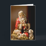Knäfalla Santa Helgkort<br><div class="desc">Den knäfalla Santaen som älskar Kristusbarnet,  är en av min favorit- julbilder. Jag har kopplat ihop den med Santas böninsida kortet. Jag tänker att skulle detta gör en mycket speciell hälsning till vänner och familjen under denna sakrala säsong av året.</div>