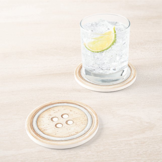 Knappar för sömnad i krämvit underlägg (Sidan)