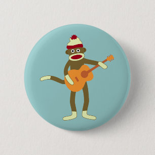 Knäppas den akustiska gitarren för sock monkey knapp