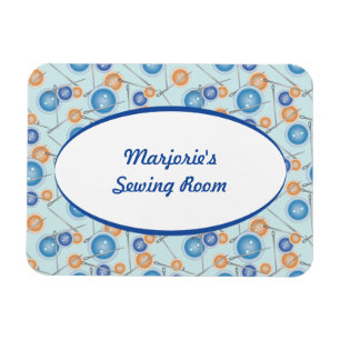 Knäppas och sömnadnålar magnet