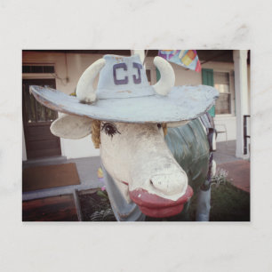 Ko i läppstift på en vykort