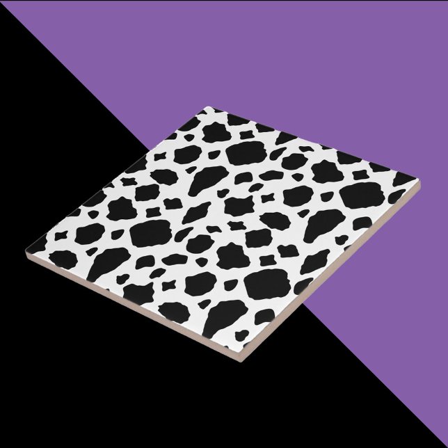 Ko Muster Svart och Vitt Lantlig Kakelplatta (A tile with a black and white cow pattern.)