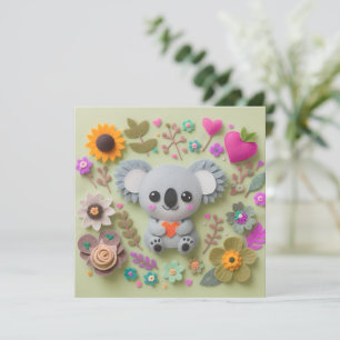 Koala med blommor som håller ett hjärta julkort