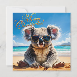 Koala på en sandstrand God jul Julkort