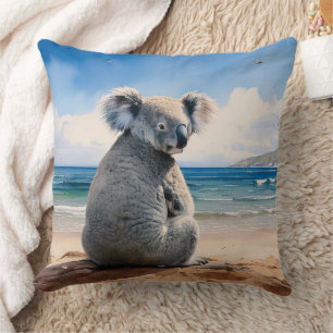 Koala på en sandstrand kudde