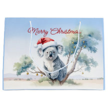 Koala sittande i ett gummiträd God Jul