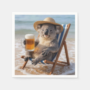 Koalabjörn med en öl på en strand pappersservett