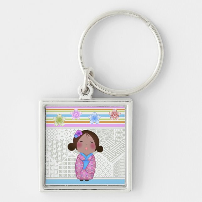 kokeshi sakura fyrkantig silverfärgad nyckelring (Framsidan)