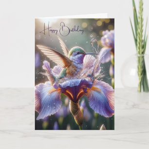 Kolibri som stänker i en lila iris kort