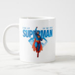 Kolla upp Superman. Jumbo Mugg<br><div class="desc">Snart in i den klassiska tecknaden bok med den här elektrifierande supermansbilden! Med stålmannen som flyger uppåt i en kraftfull attityd kanaliserar denna pulserande design vintage tecknad bok vibes med ett modernt kant. Hans röda gafflar bakom honom när han slår genom himmel, inramad av fet blå text och den ikoniska...</div>