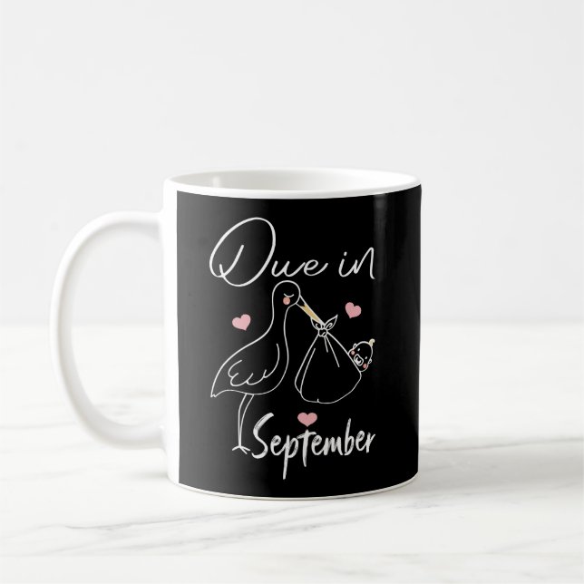 Kommer i september Rolig svan som bär en söt ny  Kaffemugg (Vänster)